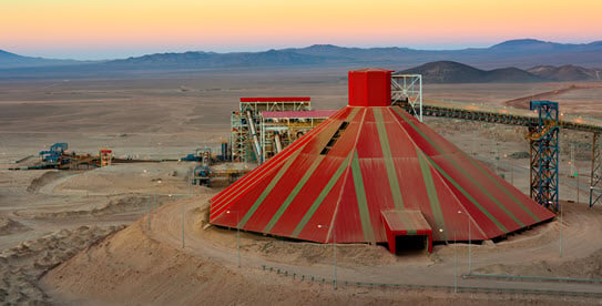 Conveyer belt and stockpile at open pit mine