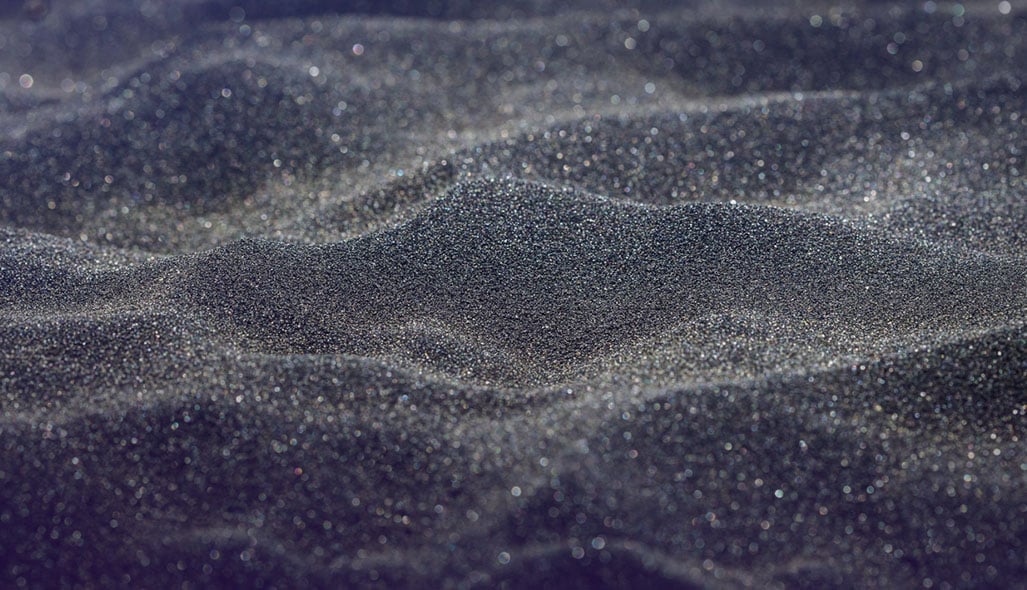 Grains of glittery grey sand