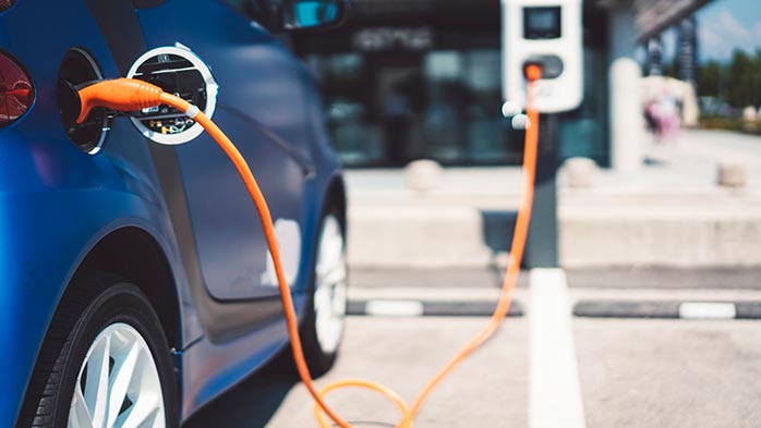 A-plug-in-EV-charging-at-a-public-charging-port