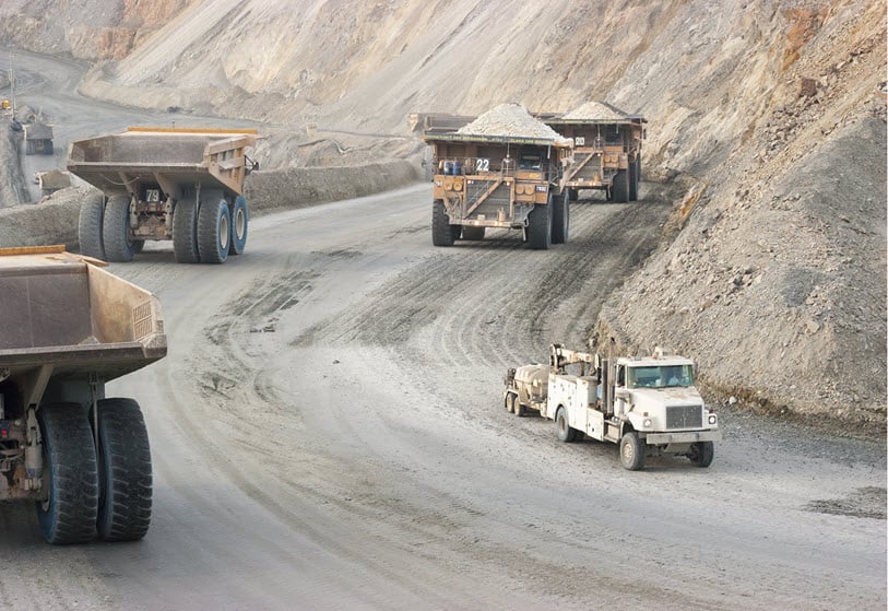 convoy-of-large-dump-truck-in-copper-mine